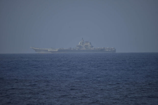 Chinese aircraft carrier Shandong sails in Pacific Ocean waters, about 300 kms (186 miles) south of Okinawa prefecture, Japan, in this handout image taken by Japan Self-Defence Force on April 5, 2023 and released by the Joint Staff Office of the Defense Ministry of Japan April 6, 2023. 