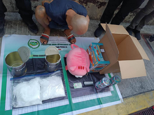 PDEA Central Luzon agents arrest a man in Mandaluyong City on May 11 over a package containing "shabu" worth P12.24 million.