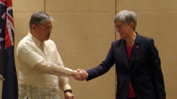 In photo: DFA Secretary Enrique Manalo and Australian Minister for Foreign Affairs Penny Wong shake hands. Australia will supply drone technology and expertise to support the Philippine Coast Guard's maritime patrol efforts.