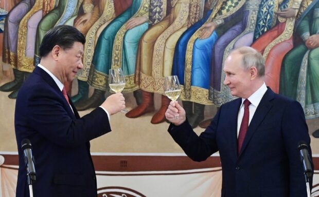 Putin applauds 'dear friend' Xi on his 70th birthday