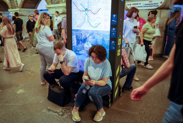 People take cover inside a subway station during an air raid alert, amid Russia's attack on Ukraine, in Kyiv, Ukraine, June 1, 2023. REUTERS/Alina Smutko