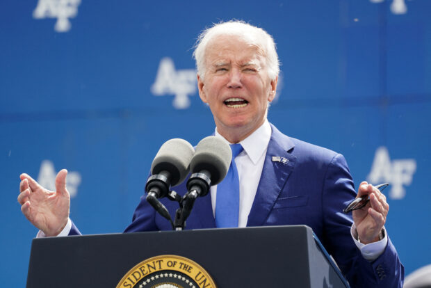 President Joe Biden trips and fall at a graduation ceremony at the US Air Force Academy on June 1, 2023.