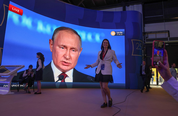 Big screen showing Russai’s Vladimir Putin. STORY: Kremlin bans Western journalists from Russia’s ‘Davos’