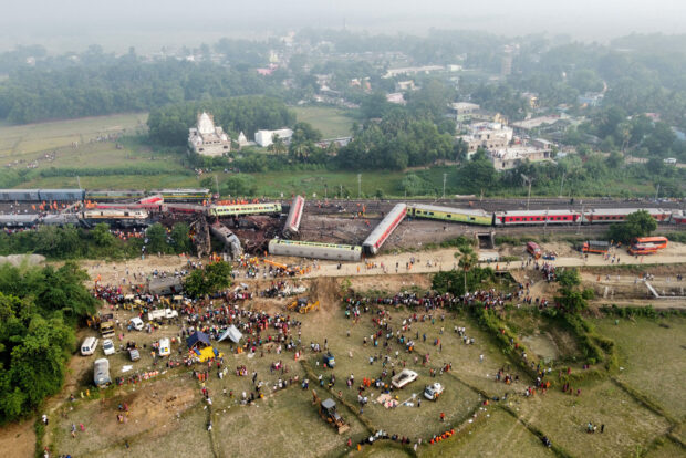 A drone view shows derailed coaches after two passenger trains collided in Balasore. STORY: India's worst train crash in decades kills at least 288