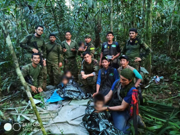 Colombian military soldiers pose for a photo after the rescue of child survivors from a Cessna 206 plane that crashed on May 1 in the jungles of Caqueta, in limits between Caqueta and Guaviare, in this handout photo released June 9, 2023. Presidency/Handout via REUTERS