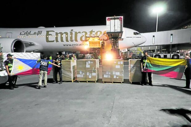 VITAL CARGO More than 390,000 doses of bivalent COVID-19 vaccines are unloaded on Saturday night at Ninoy Aquino International Airport. The donation by the Lithuaniangovernment will help boost the country’s coronavirus response against the original strain and its Omicron subvariants BA.4 and BA.5, the Department of Health said. DOH photo
