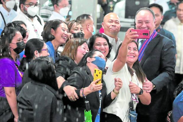 SECOND STINT Newly appointed Defense Secretary Gibo Teodoro becomes a “groufie” target following arrival honors welcominghim—again—at Camp Aguinaldo on Wednesday. Teodoro held the same post during the Arroyo administration. —File picture from GRIG C. MONTEGRANDE     