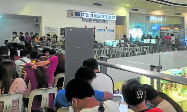 People applying for clearance at the National Bureau of Investigation in its satellite office in Lapu-Lapu City, Cebu, wait for their turn to be called, as shown in this photo taken in January 2023. STORY: 6 NBI Cebu workers face raps over ‘clearance fee’ racket