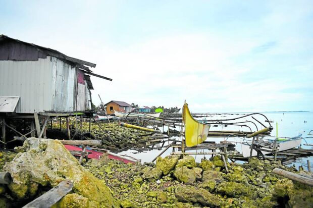 This shanty, one among many makeshift houses built along the coastal village of Punta Kawit in Dapa town on Siargao Island, has no proper toilet, and human and household waste go directly into the sea. STORY: Siargao no paradise for informal settlers