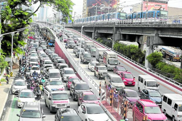 Vehicles on EDSA STORY: House eyes tax hike on vehicle owners