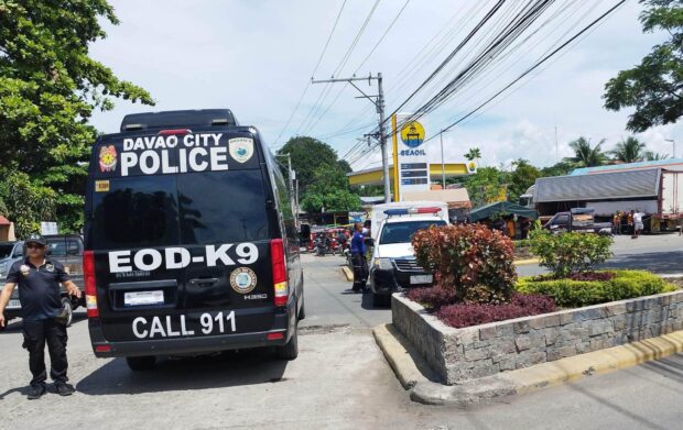 Bomb disposal teams of the Davao City Police Office investigate a blast that damaged the car of lawyer Alberto Magulta at the One Oasis Davao in Matina, Davao City on Thursday, June 15, 2023. STORY: Police chief eyes work issue, personal grudge in bombing of lawyer’s car