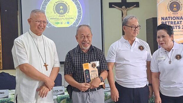 Cebu Archbishop Jose Palma (left) interacts with guests during the press conference for the "National Retreat for Priests" held at the Archbishop's Palace in Cebu City on Tuesday morning, June 20. (DALE ISRAEL / INQUIRER VISAYAS)