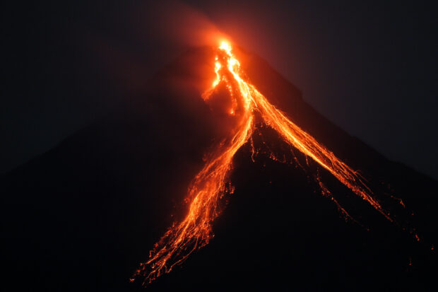 Flaming lava can be seen cascading from the crater as restive Mayon Volcano remains on alert level 3. STORY: A week of unrest as Mayon continues to spew lava, debris