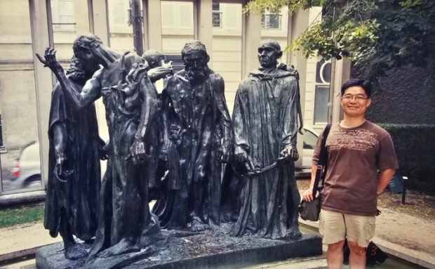 Oh Chang-eun stands in front of the Burghers of Calais at the Rodin Museum in Paris