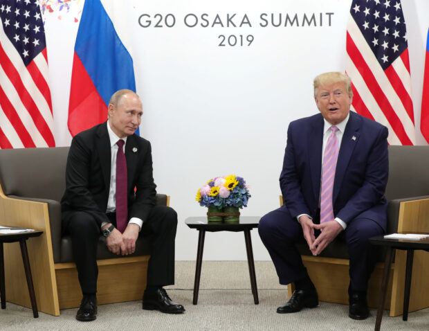 Russia's President Vladimir Putin and U.S. President Donald Trump attend a meeting on the sidelines of the G20 summit in Osaka, Japan June 28, 2019. Sputnik/Mikhail Klimentyev/Kremlin via REUTERS/File Photo
