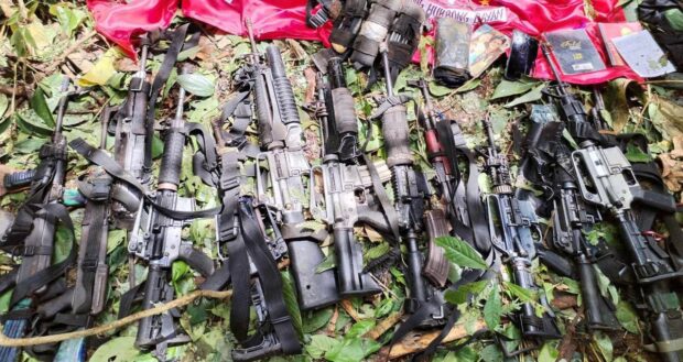 Three suspected communist rebels are killed and over a dozen firearms seized following a firefight between New People's Army insurgents and government troops in a hinterland village in Butuan City on Friday, according to the military. (Photos courtesy by Eastmincom)