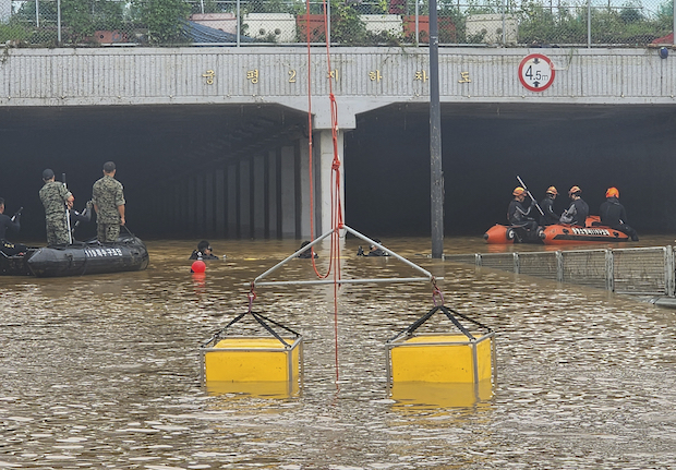 9 bodies pulled from flooded tunnel in South Korea