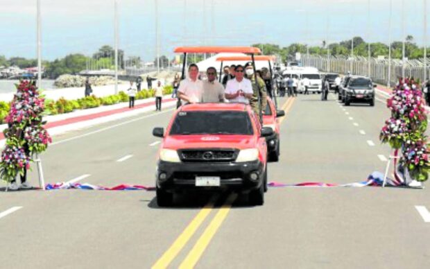 President Marcos leads a convoy througha finished segment of the Davao City Coastal Bypass Road Project in Davao City. STORY: Marcos launches P46.8-billion road project in Davao City