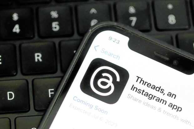 LATEST STRAND The Threads logo is displayed on a cell phone on July 5 in California. Instagram parent company Meta is set to release Threads on July 6, a potential rival to Twitter, the fledgling social media app run by Tesla CEO Elon Musk. —AFP