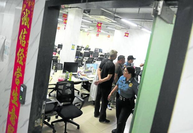 SERVING WARRANTS Police units continue to serve five warrants to search, seize and examine data and two search warrants issued by a court against Philippine offshore gaming operator (Pogo) service provider Xinchuang Network Technology Inc. in Las Pinas City. —MARIANNE BERMUDEZ