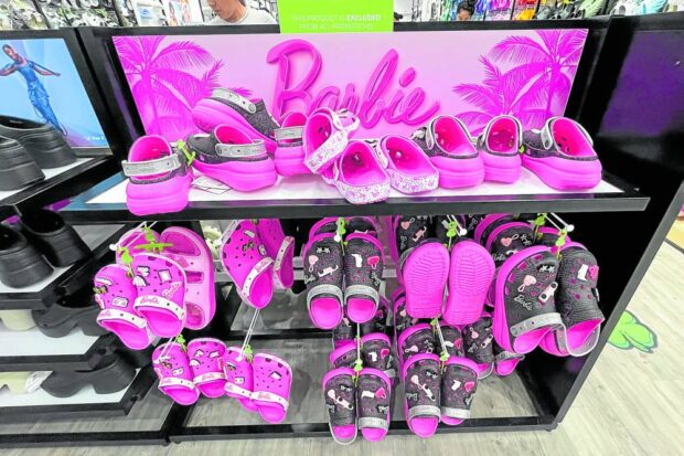 COLOR ME PINK Barbie-themed merchandise is displayed at a mall in Glendale, California on July 17. The release of the new Barbie film has ignited a world-wide demand for products and services that reflect the doll and her pink-encrusted universe. - REUTERS