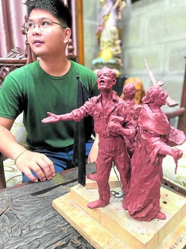MAQUETTE A monument for peasant guerillas who fought the Imperial Japanese Army during World War II is shaping up in the woodcarving district of Betis in Guagua town, Pampanga through this maquette, or a small clay study or model, by young artist Josef Andre "Totek" Layug. TONETTE T. OREJAS