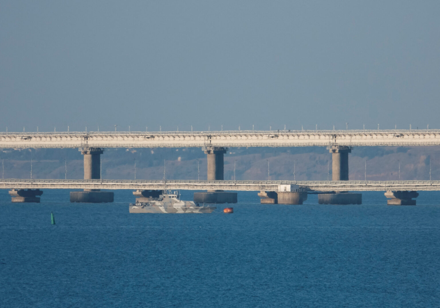 Crimea Bridge, key Russian supply line, damaged, two dead, reports of