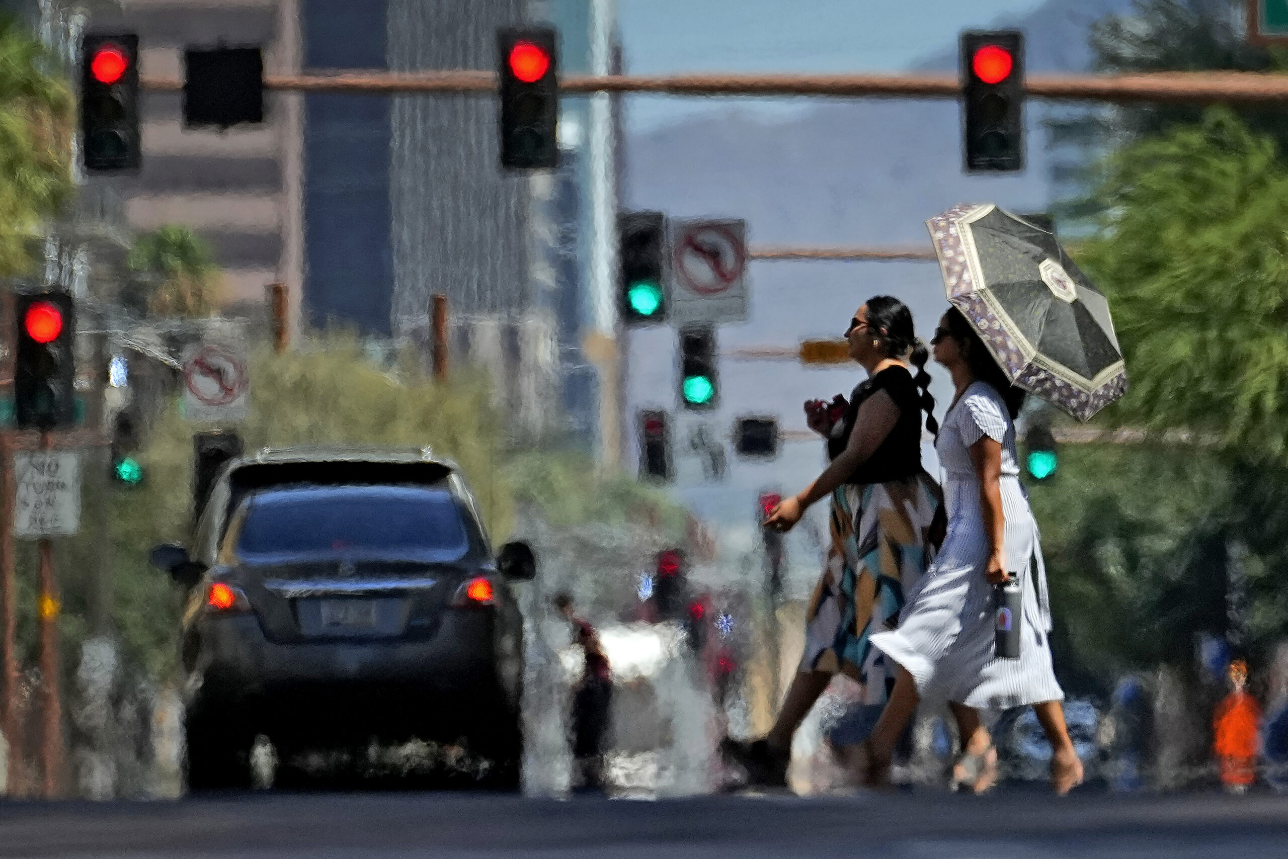 Day and night Phoenix has sweltered from heat that will break a record