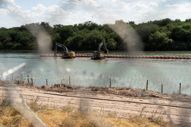 US sues Texas over floating border barriers