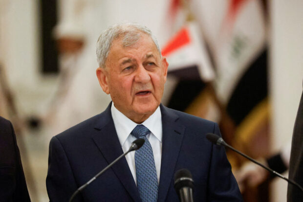 FILE PHOTO: Iraqi President Abdul Latif Rashid speaks during a news conference as an ancient artifact brought back from Italy is exhibited, following his visit to Rome, in Baghdad
