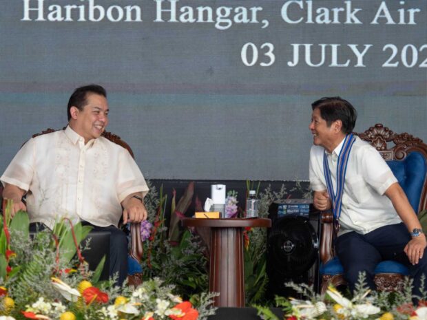 Speaker Ferdinand Martin G. Romualdez and President Ferdinand R. Marcos, Jr. share a light moment before the start of the ceremonies for the 76th founding anniversary of the Philippine Air Force held Monday morning at the Haribon Hangar in Clark Air Base, Mabalacat, Pampanga.