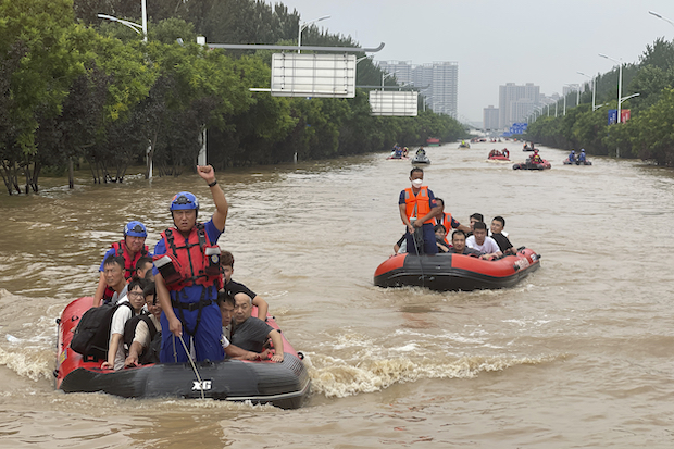 21 dead as Beijing gets heaviest rainfall in 140 years causing severe flooding