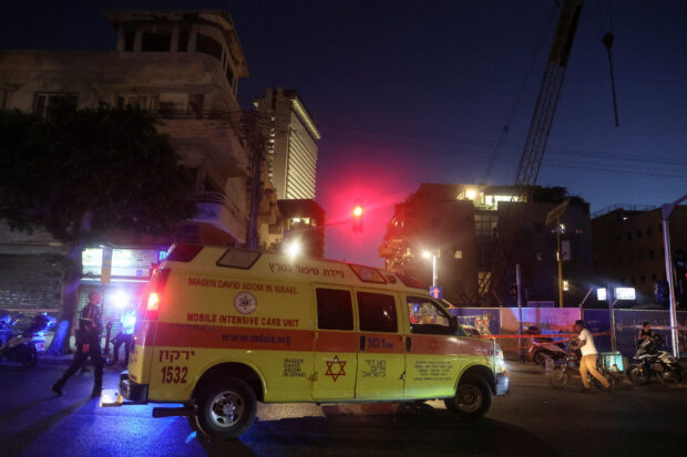 An emergency response vehicle is seen near the site of a suspected shooting attack in Tel Aviv, Israel August 5, 2023. REUTERS/Nir Elias