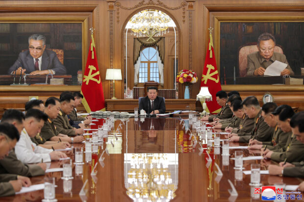 North Korean leader Kim Jong Un dismisses the military's top general and calls for more preparations for the possibility of war