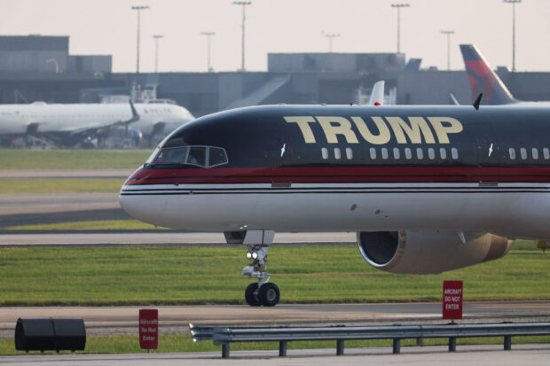 Donald Trump arrives in Atlanta to get his mug shot taken at a local jailhouse