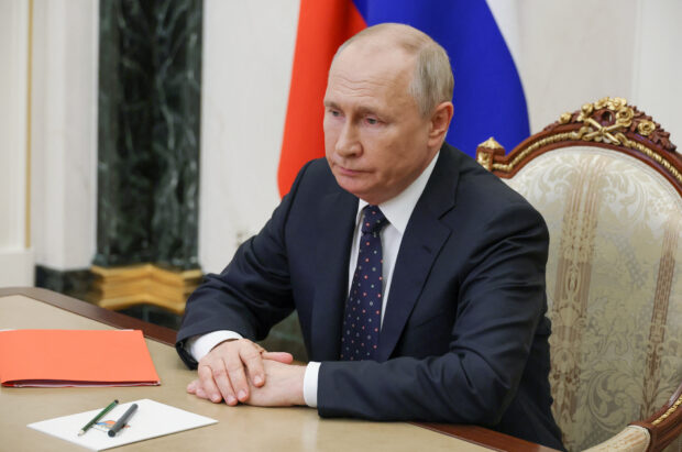 Russian President Vladimir Putin chairs a meeting with members of the Security Council via video link at the Kremlin in Moscow, Russia August 25, 2023. Sputnik/Mikhail Klimentyev/Kremlin via REUTERS