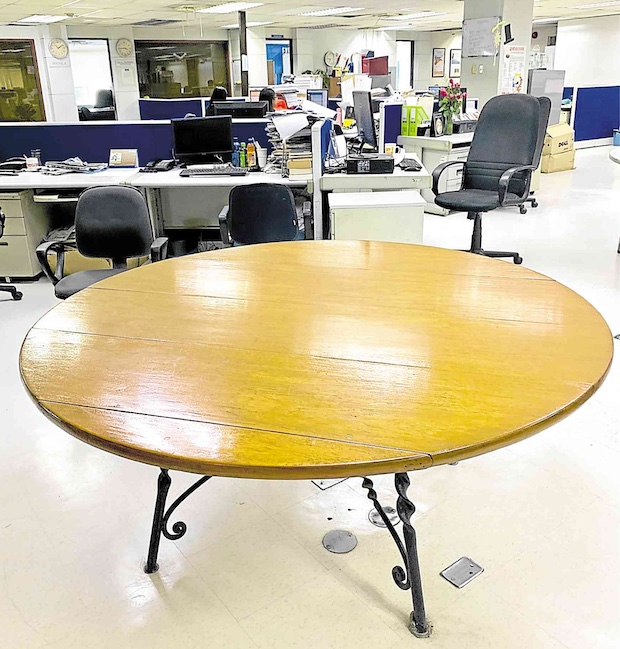The big, round wooden table from the early days of the paper will also make the move to the newer building.