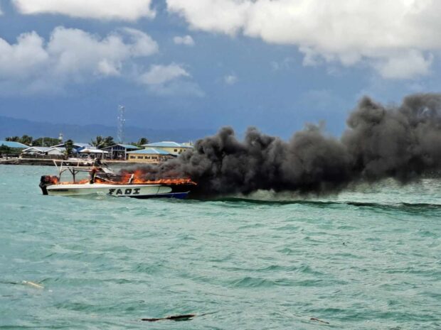PCG rescues 3 persons from a burning speed boat in Zamboanga City