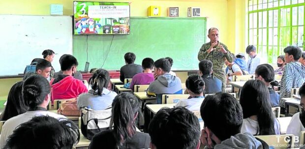 WINNING YOUNG HEARTS AND MINDS An Army officer under Task Group Baguio—a joint military and police team on a mission to keep the youth from being recruited by communist insurgents—addresses a class of Grade 10 students at Bakakeng National High School in Barangay Bakakeng Norte, Baguio City, in this photo taken in June. —PHOTO FROM TASK FORCE BAGUIO FACEBOOK PAGE