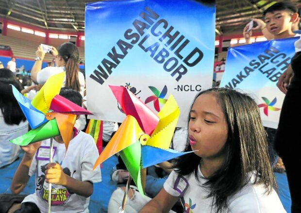Children join a program held at San Andres Gym in Manila marked World Day Against Child Labor, in this photo taken on June 23, 2018.
