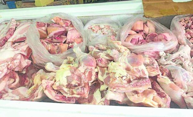 Stocks of pork believed to be unsafe for consumption are confiscated by personnel of the Cebu City government’s Department of Veterinary Medicine and Fisheries in a surprise inspection early in August.