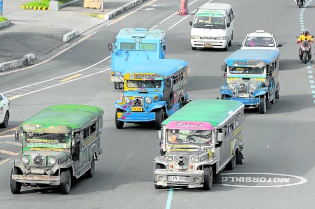 Jeepneys ferry passengers along Commonwealth Avenue in Quezon City on Tuesday, Aug. 22, 2023.