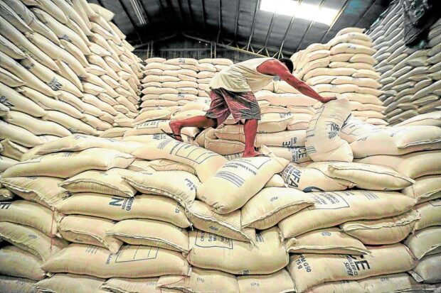 Sacks of rice are stockpiled at National Food Authority warehouse in Quezon City in this photo taken in 2020. 