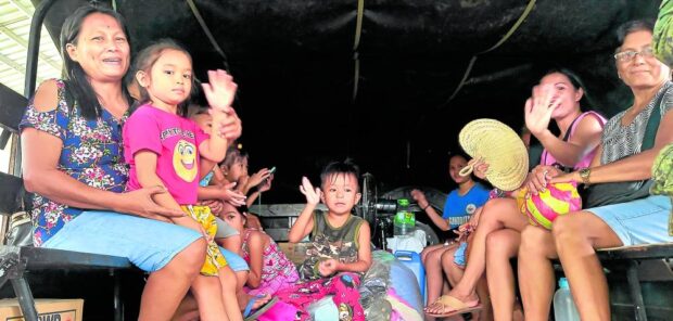 In Albay town, evacuees outside of Mayon danger zone sent home