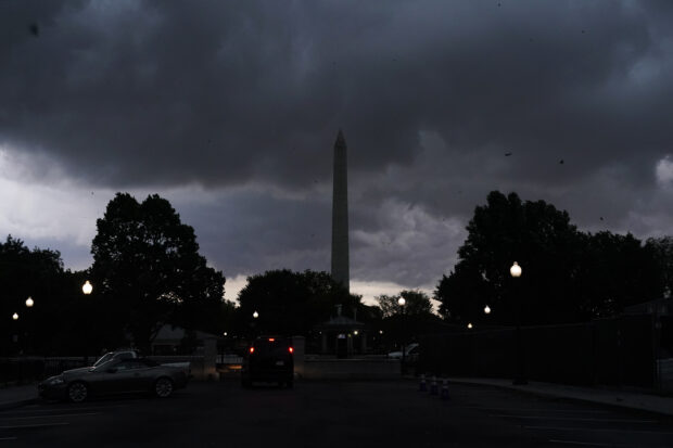 Thousands of US flights are canceled or delayed, and more than 1.1 million homes and businesses lost power as destructive strong storms loom