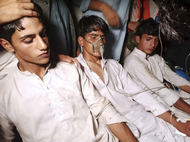 APTOPIX Pakistan Children Trapped