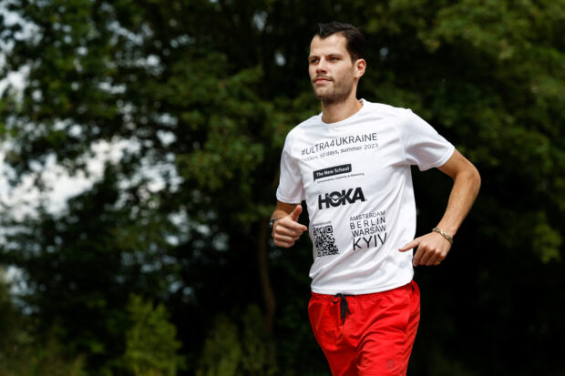Dutch runner Boas Kragtwijk runs after an interview with Reuters in Amsterdam