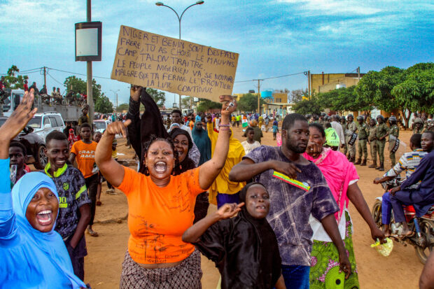FILE PHOTO: Niger's junta supporters take part in a demonstration in front of a French army base in Niamey,