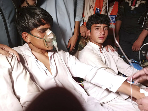 Pakistani children rescued from a broken cable car 