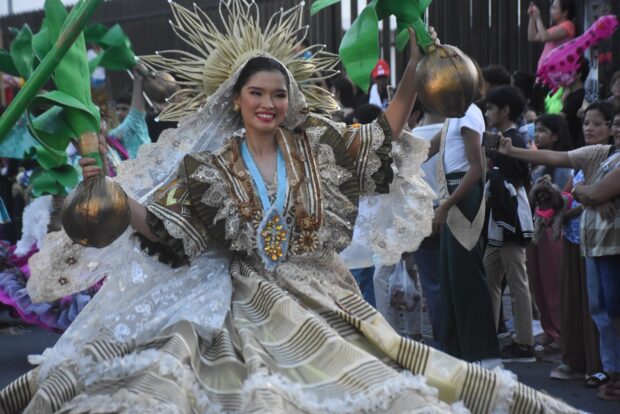 Street dancers in colorful costumes sway to the beat of the music on the main thoroughfares of Lucena City in Quezon province at the end of the “Niyogyugan Festival” on Saturday. The festival pays tribute to the coconut farming industry in the province.